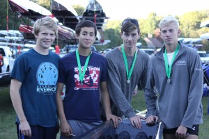 Ryan Purday, Brad Hufnagel, Kaare Andersen and Chris Martensson display their medals on Saturday. All four are off to Boston for the Head of the Charles.